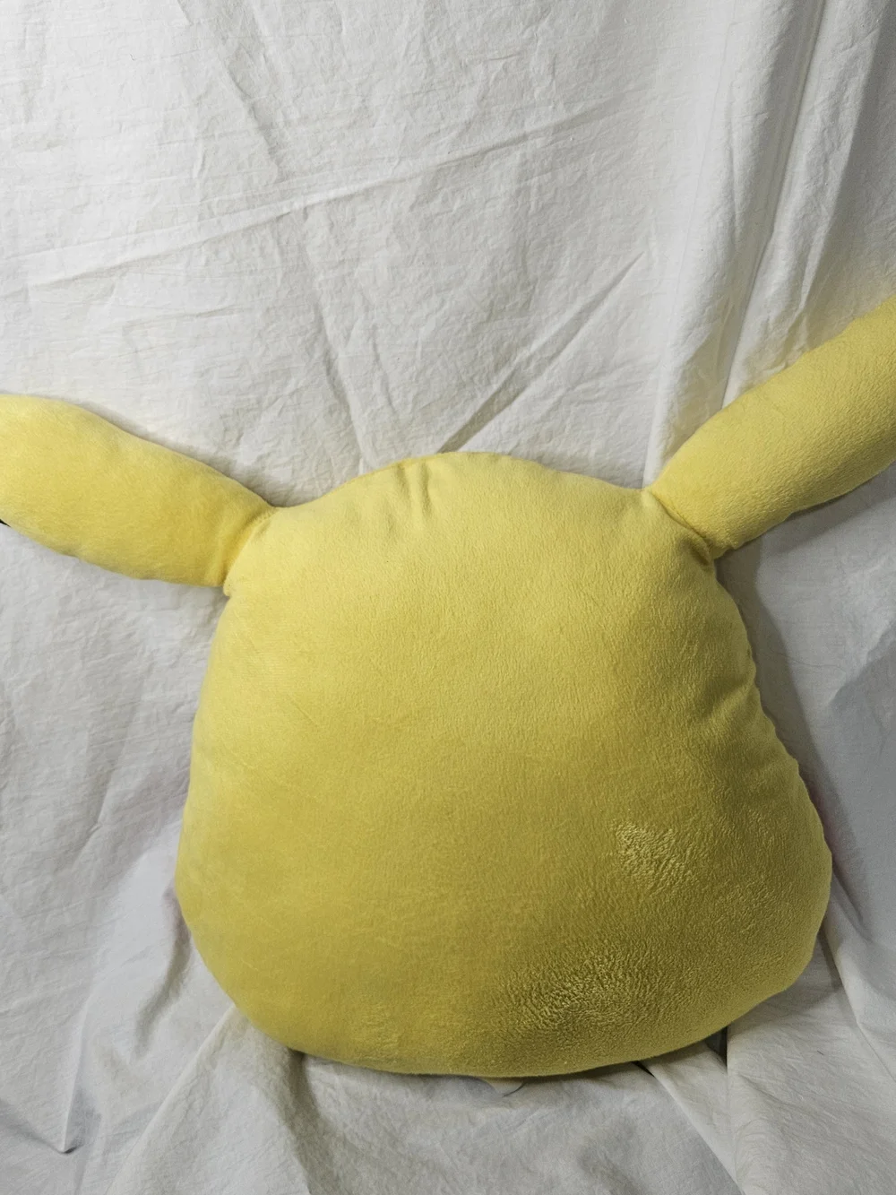 The Pokemon Pikachu Head Plush Pillow.